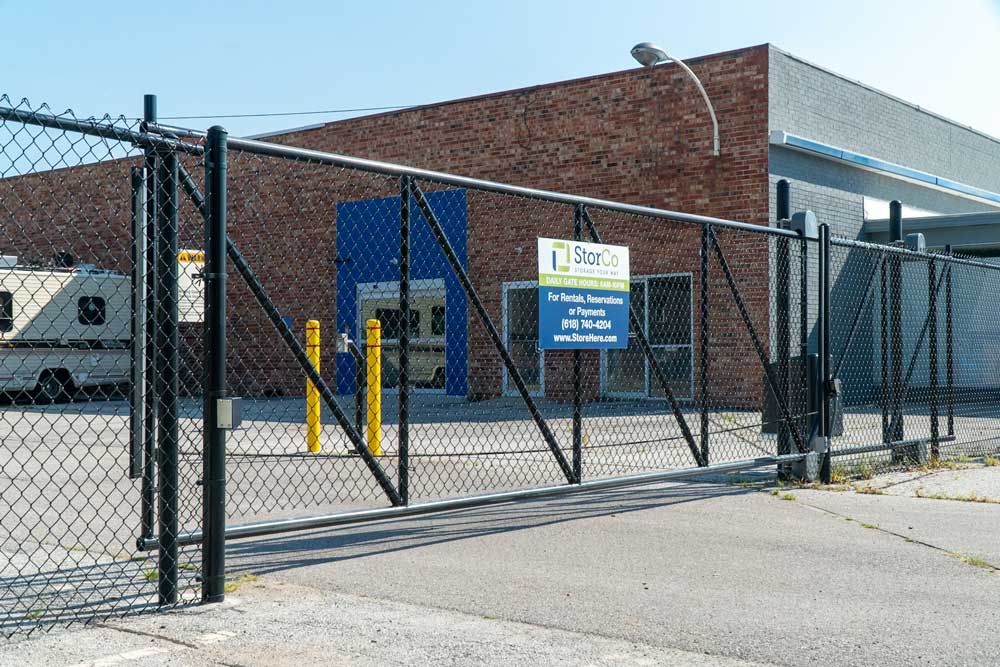 Chain link fence and gate around storage facility