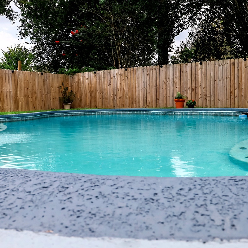 Pool Fence Feature Wood fence around pool and patio
