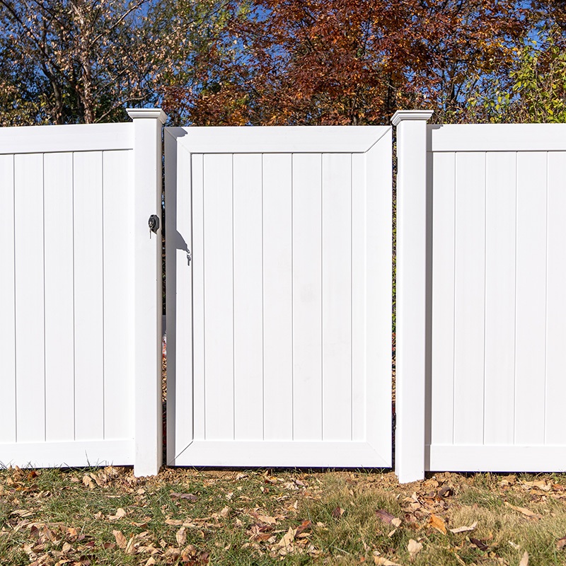 Swinging Gate Feature White vinyl swinging gate