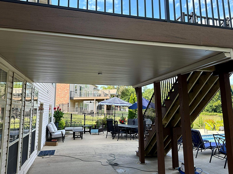 Underdeck system with chairs below