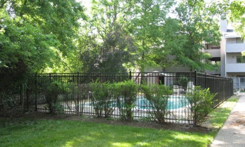 Steel fence around pool