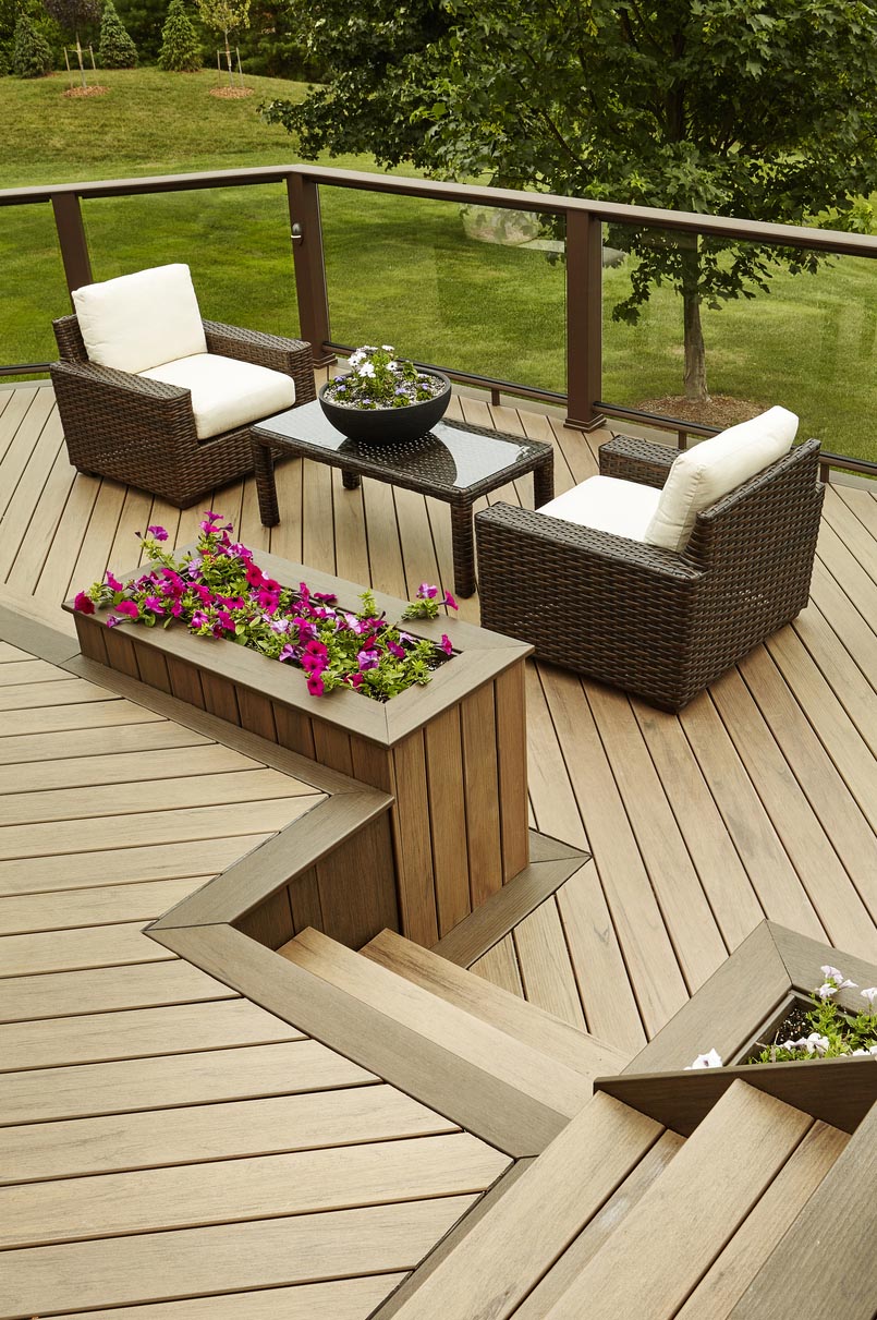 Furnished TimberTech deck with stairs and diagonal planks