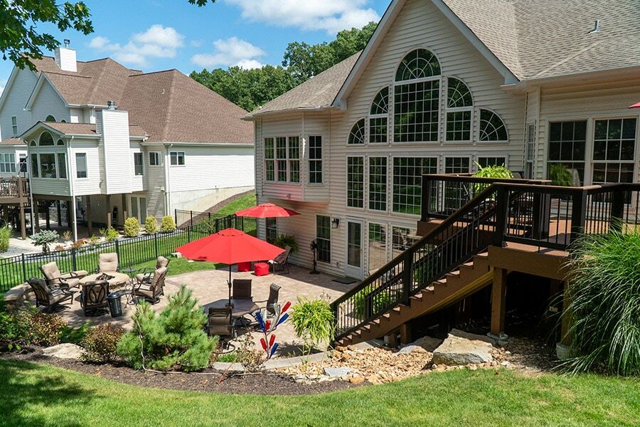 Composite deck and aluminum fence