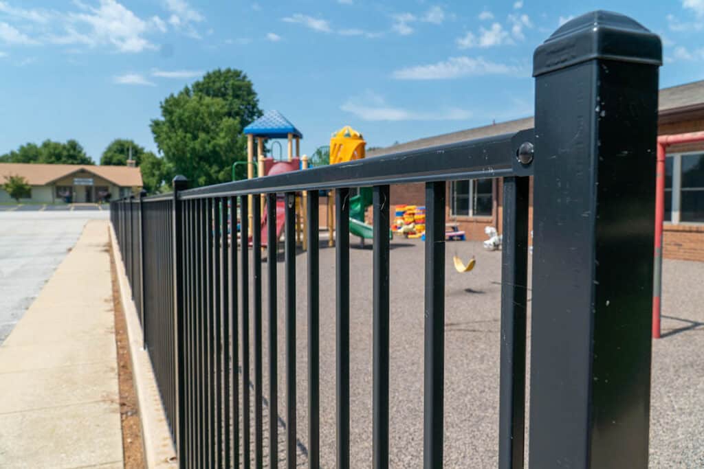Aluminum fence around playground