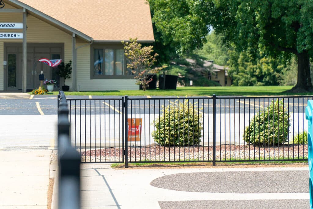 Aluminum fence around playground