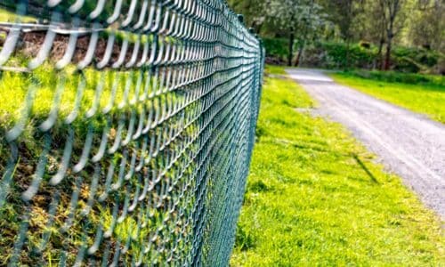 Chain-link fence along road