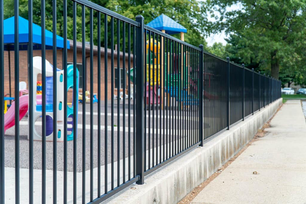 Aluminum fence around playground