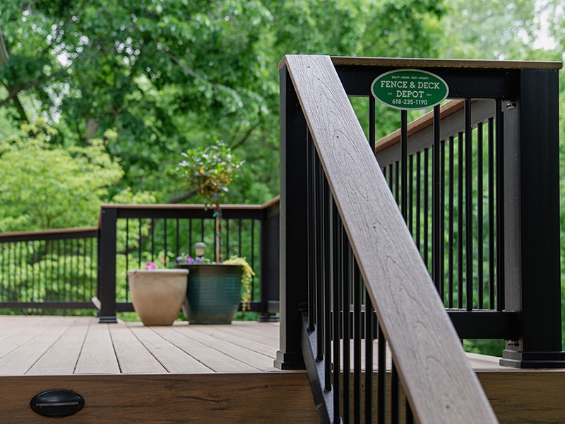 Fence and Deck logo on a picture frame deck