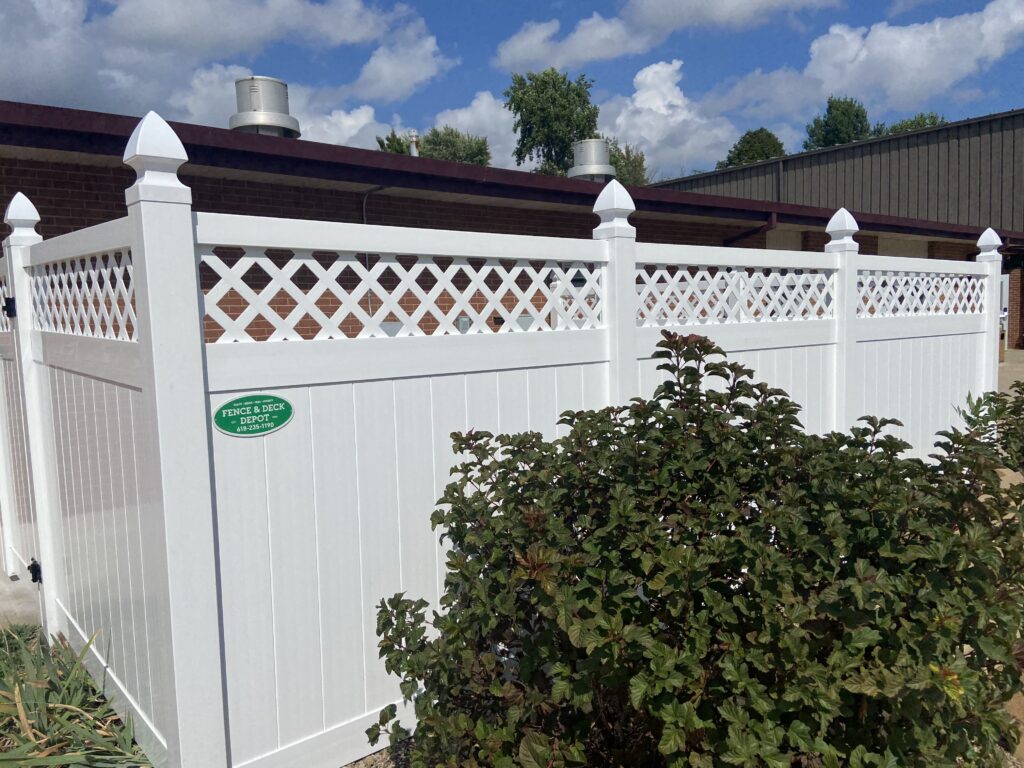 Tall vinyl privacy fence with lattice