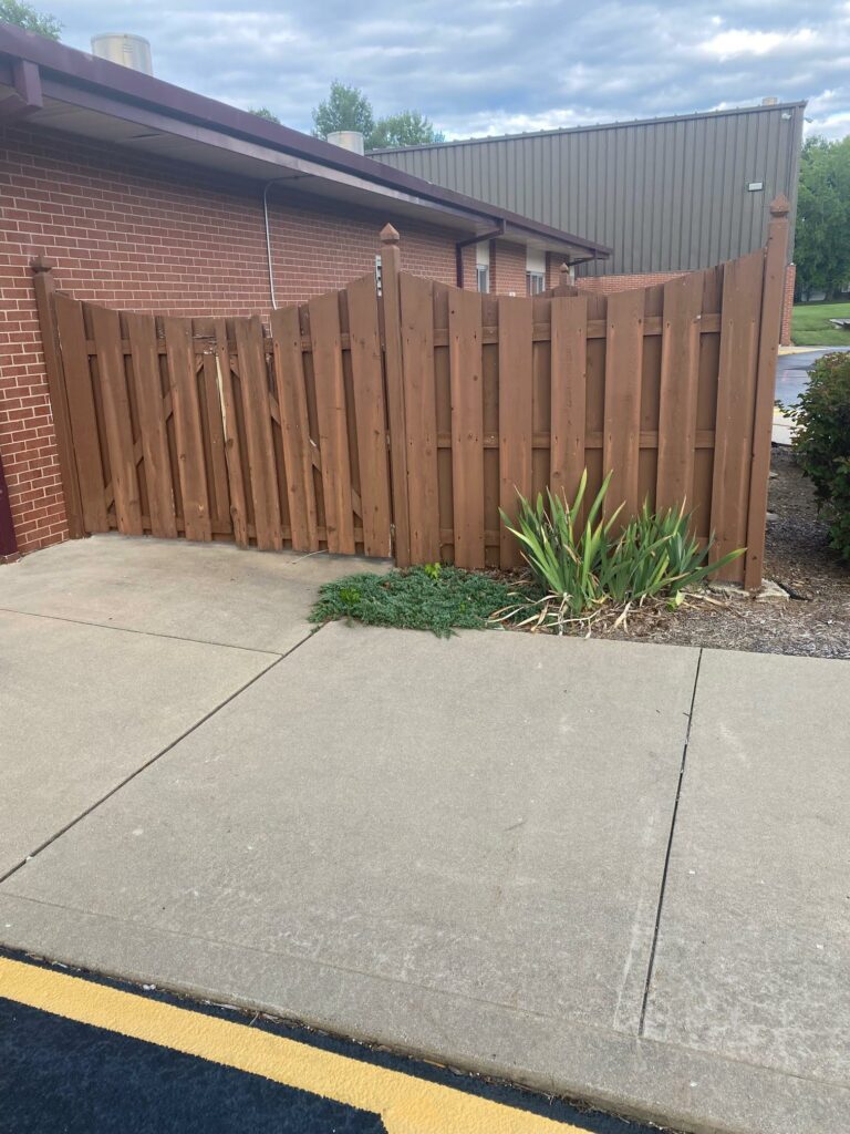 Before image of old fence