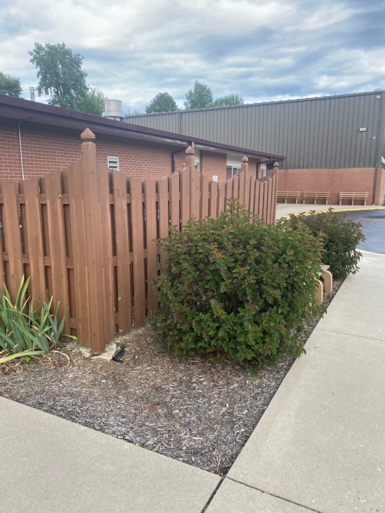 Before image of old fence