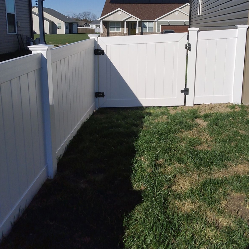 White privacy fence with gate