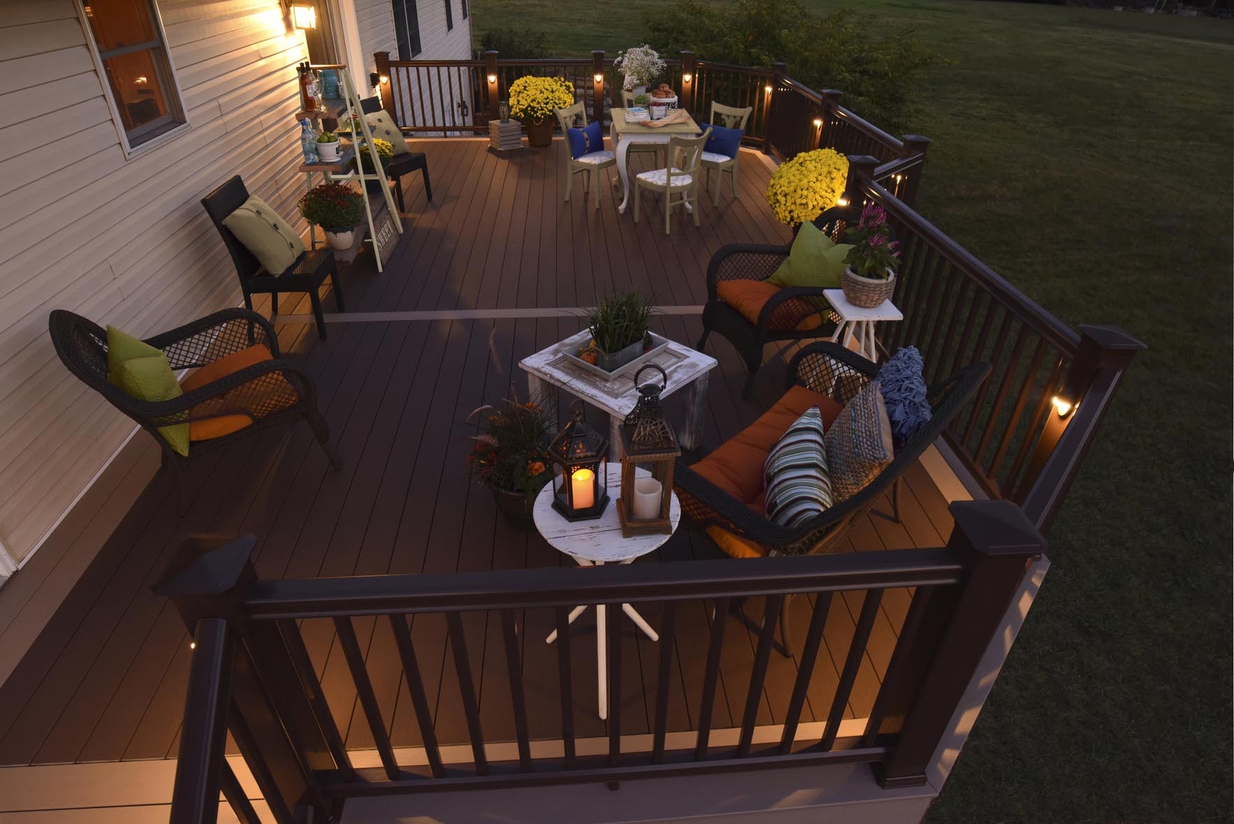 TimberTech deck with modern furnishing and lighting at dusk