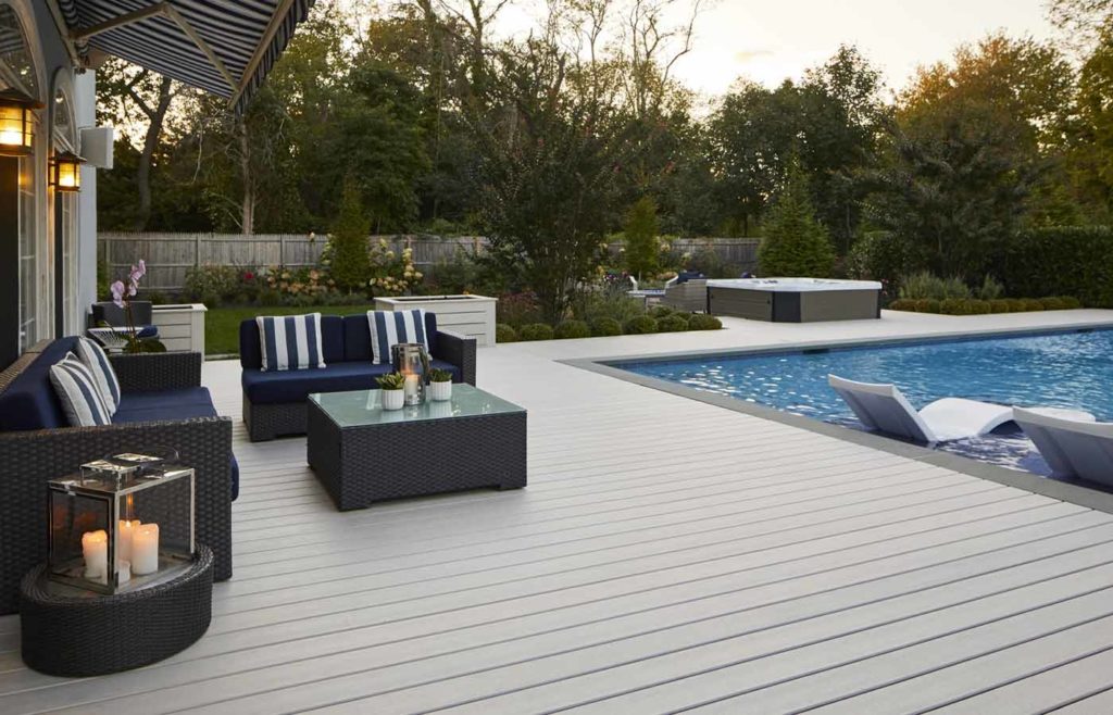 Large TimberTech deck around clean pool