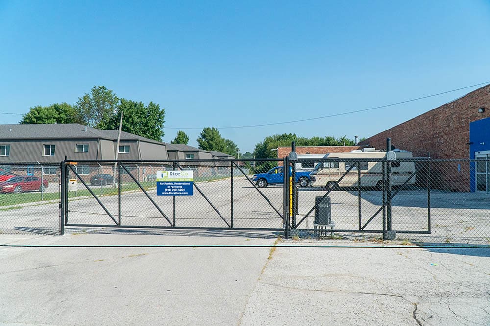 Chain link fence and gate around storage facility