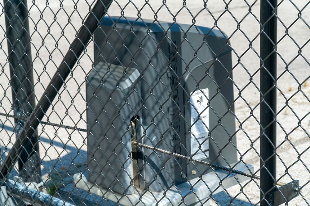 Chain link fence and gate around storage facility