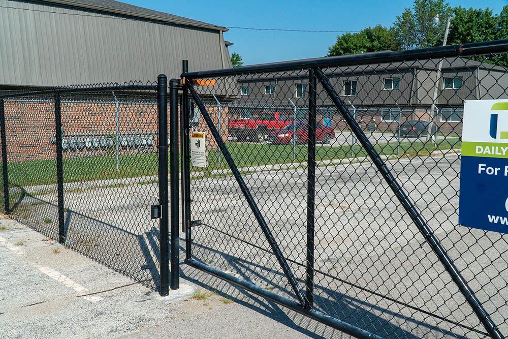 Chain link fence and gate around storage facility