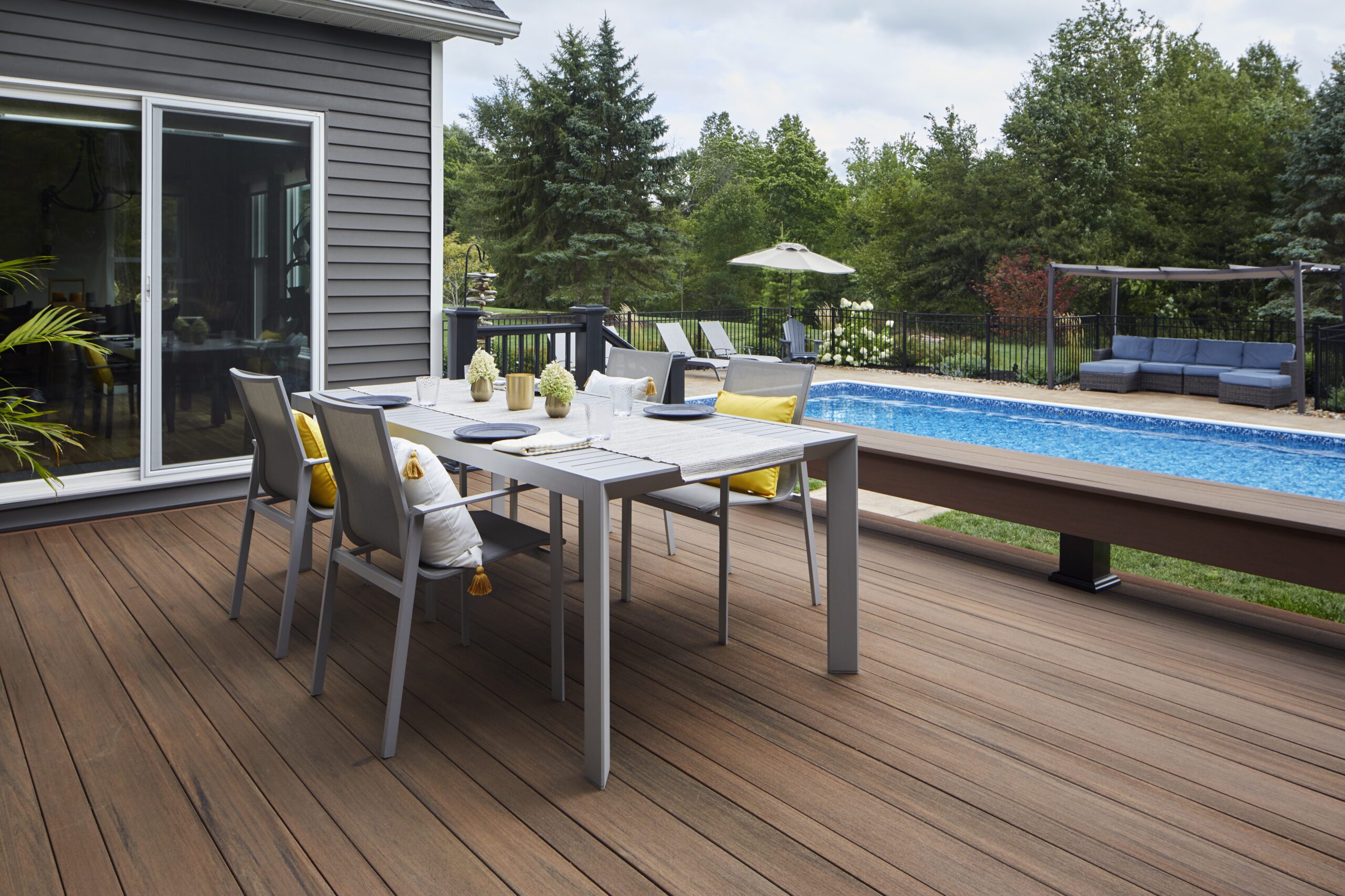 TimbetTech deck with crystal blue pool built in