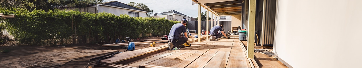 Men building a deck